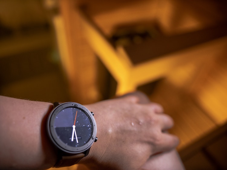 smart watch on wrist in sauna