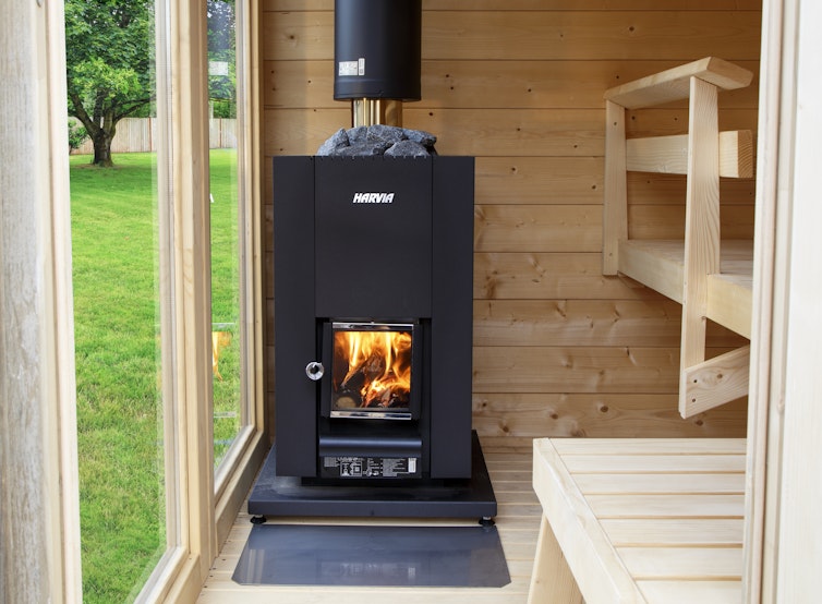 Harvia BimSchV2 wood burning heater inside sauna