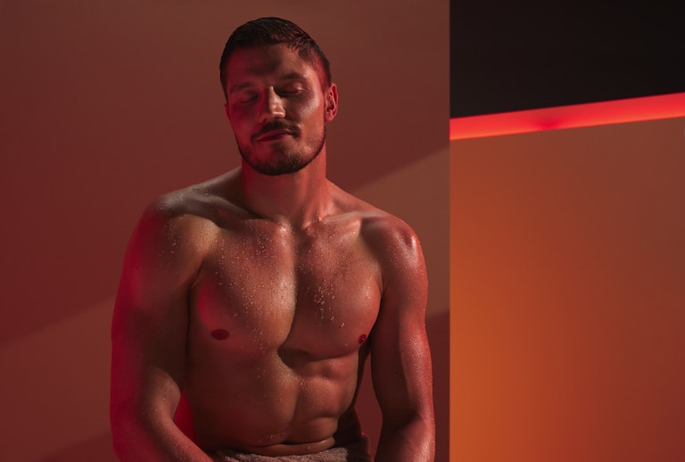 man enjoying infrared sauna