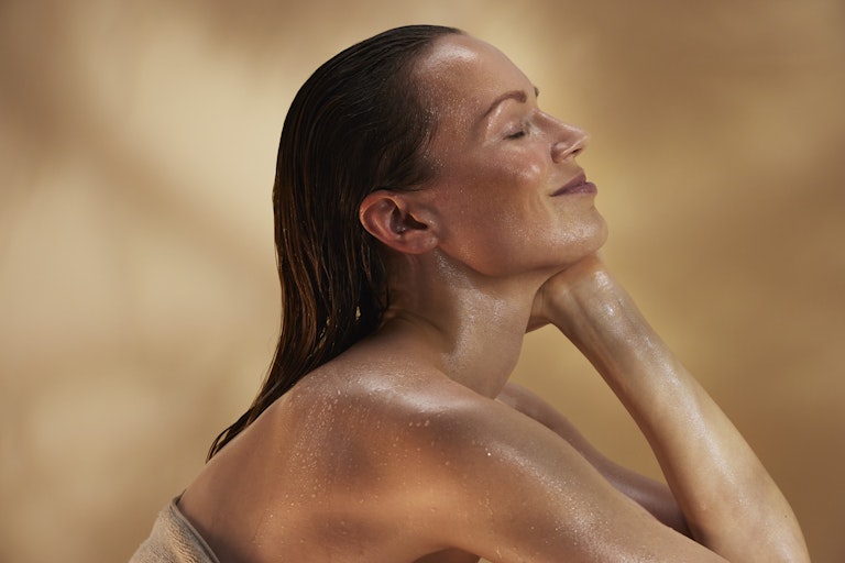 woman enjoying sauna