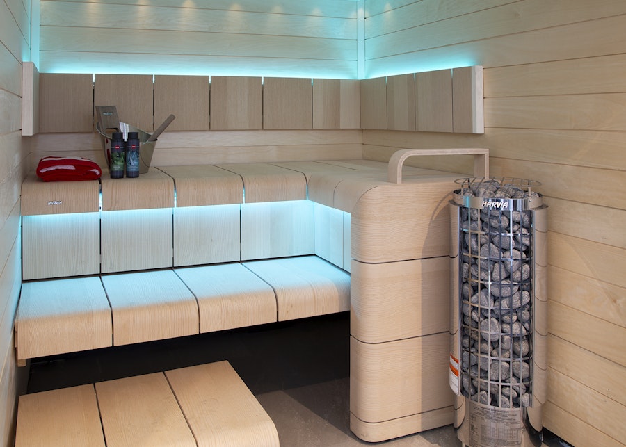 Harvia Cilindro Half Series pillar electric sauna heater with stainless steel exterior and stone bed