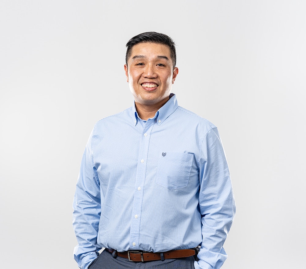 A photo of Michael Tran, IT Support Specialist at Nacero