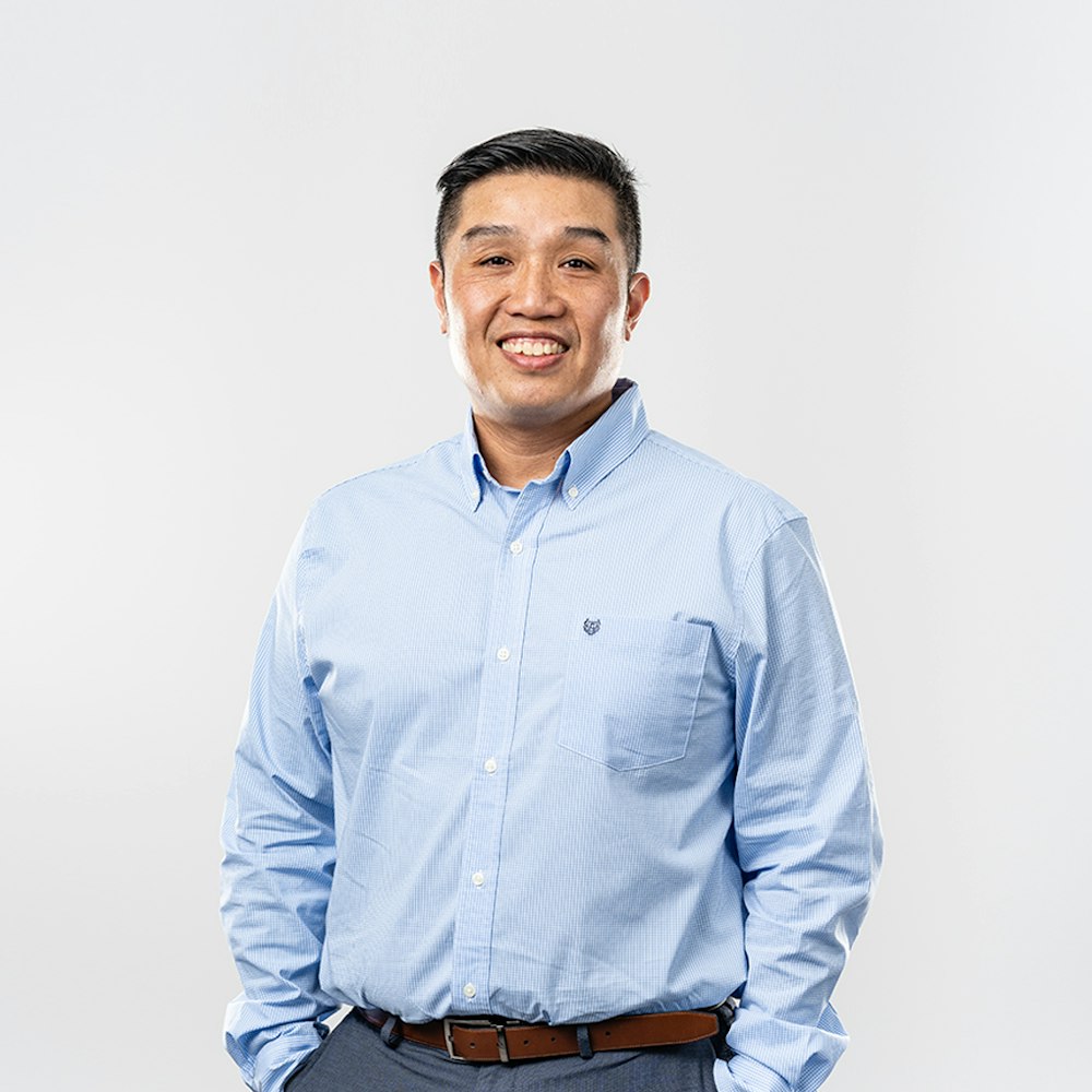 A photo of Michael Tran, IT Support Specialist at Nacero