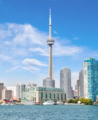 City with a very tall needle-like tower in the middle