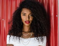 Beautiful woman with very curly hair