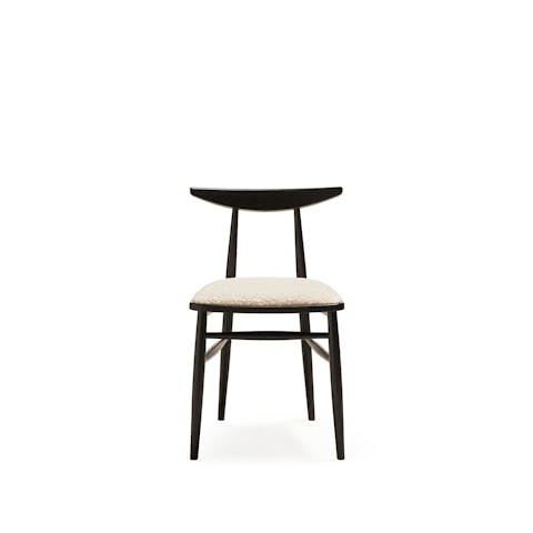 Timeless armchair without armrests Timeless armchair front on white background