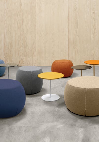 Group of Point poufs near tables