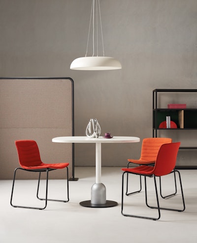Rudy armchairs in a collection environment around a round table