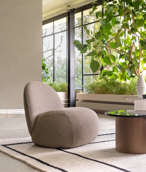 Upholstered Hill chair Hill in lightfull living room