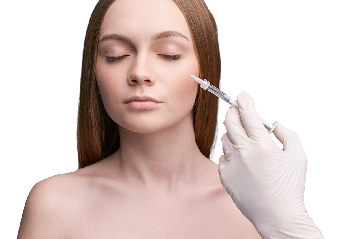 A woman's face being injected
