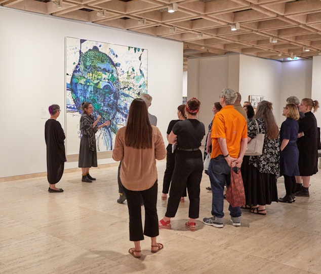 Tour group in front of John Olsen's Five bells 1963 Art Gallery of New South Wales. Purchased with funds provided by the Art Gallery Society of New South Wales 1999 © John O