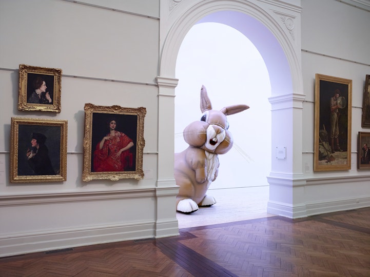 Michael Parekowhai’s 2006 inflatable sculpture Cosmo McMurtry sneaks a peek at paintings in the Old Courts.