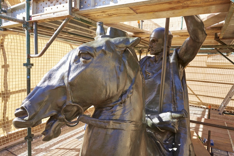Scaffolding set-up for the treatment of 1923 bronze sculpture The Offerings of War by Gilbert Bayes. Project supported by the Minister’s Stone Program.