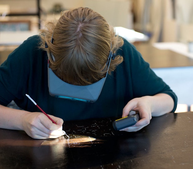 *Filling the cracks*
Modostuc® was used to fill the deepest drying cracks. This conservation filler can be diluted quite thinly with water which was helpful given the very fine size of the cracks.
