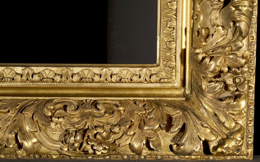 The right lower corner of the frame after in-gilding and toning down to match the surrounding original gilding.