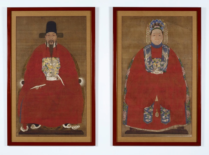 The restored paintings in their new lacquer frames.