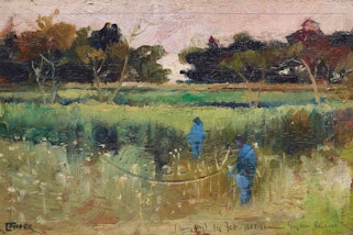 Two figures in a field with trees in the background