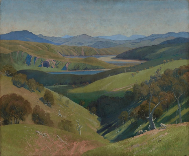 A painting of a green valley with cool blue mountains on the horizon. A river snakes between the hills of the valley.