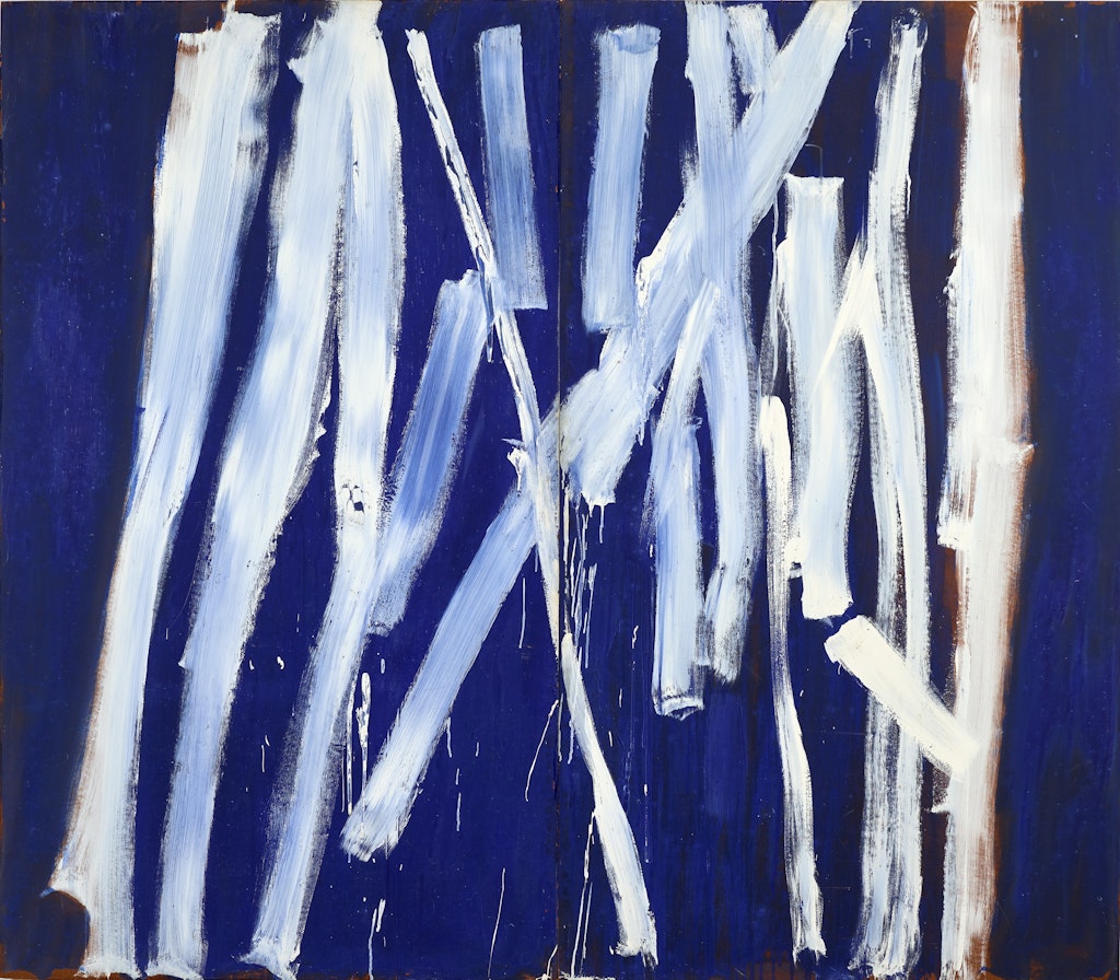 An almost-square painting, made of two panels, with around 15 tightly clustered white lines on an ultramarine background. Expressively painted, most of the lines are vertical, although two diagonal lines intersect in the centre.