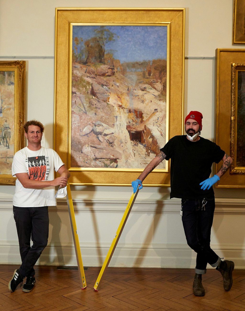 Jake van Dugteren and Kane Hancock with Arthur Streeton's [w:832[Fire’s on]] 1891, Art Gallery of New South Wales