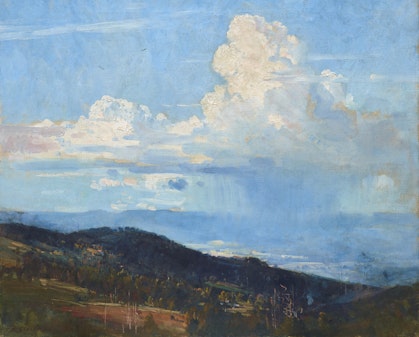 A blue sky with a large cloud from which rain falls on distant hills and pastures. There are green , sloping hills with trees in the foreground.