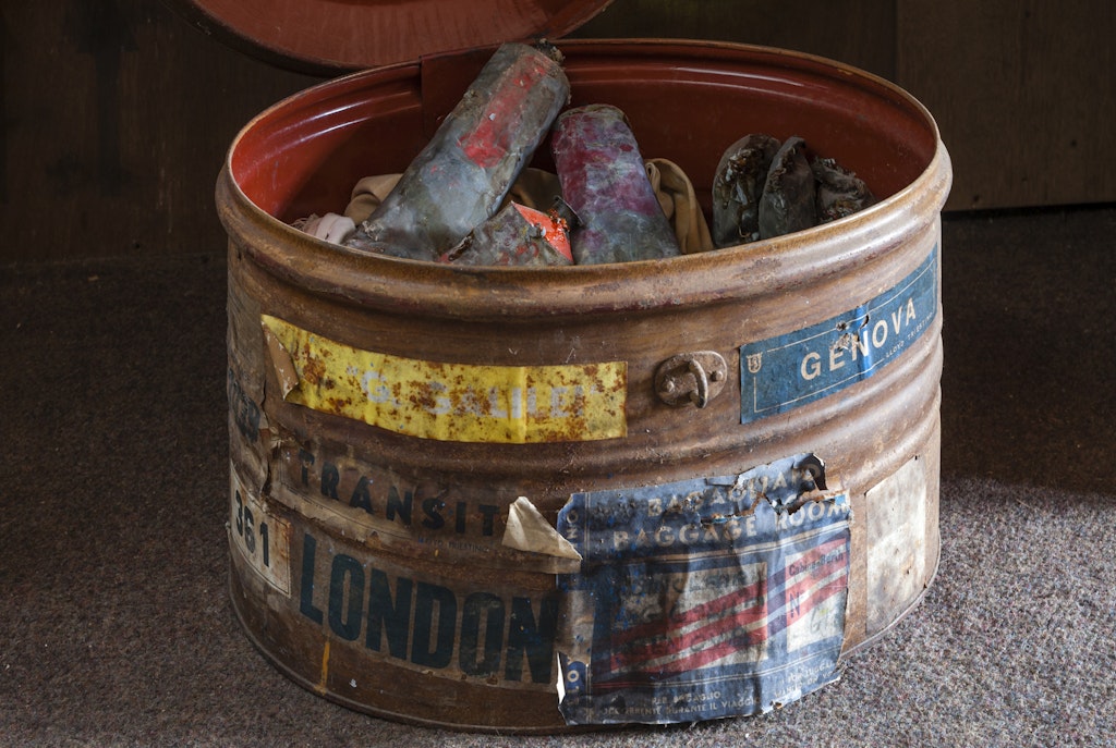 The oval tin in which Nolan kept tubes of oil paint mixed by Arthur Boyd. Photo by Alex Ramsay