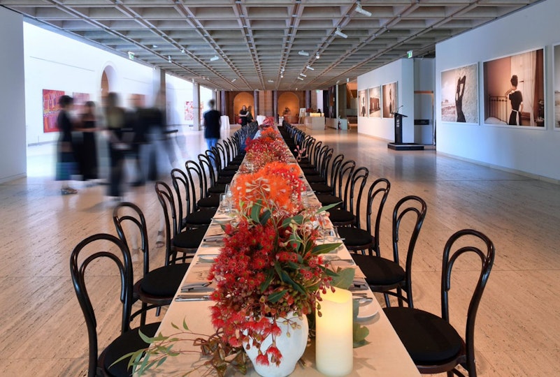 Entrance Court, dinner with long tables. Photo: Fiora Sacco. 