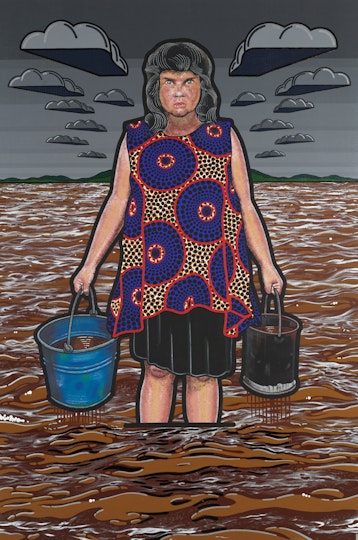 A person stands calf-deep in water holding a bucket in each hand.