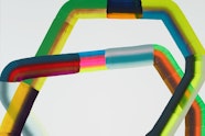 A bending, segmented multi-coloured tube