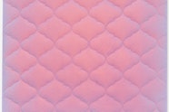 A bed mattress painted in pinkish purple.