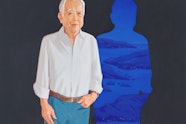 A person with short hair wearing a white shirt and blue pants. Beside them is a blue silhouette of their figure, filled with landscape imagery.