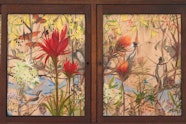 A painting of a landscape filled with flowers and animals framed in four sections.