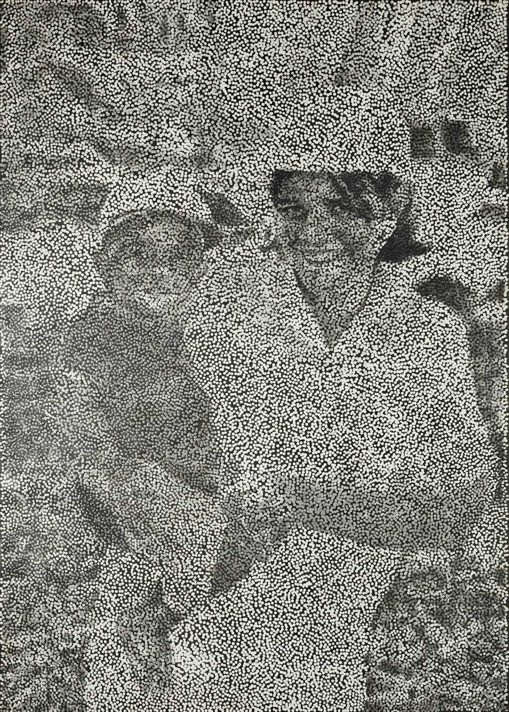A person holds a child on their hip