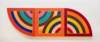 A colourful three-panelled work with a pattern of curves