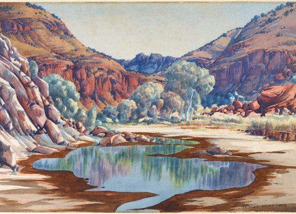 A watercolour painting of a waterhole among rocks, trees and hills
