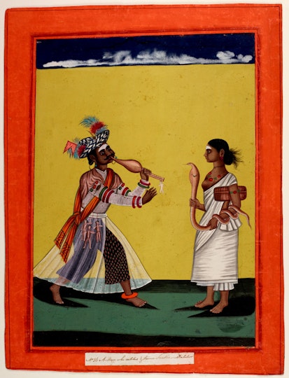 A painting with a bright orange border depicting a person playing a wind instrument opposite another person holding a snake