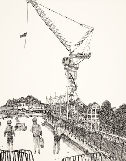 Three people in hard hats work towards a construction site that includes a giant crane