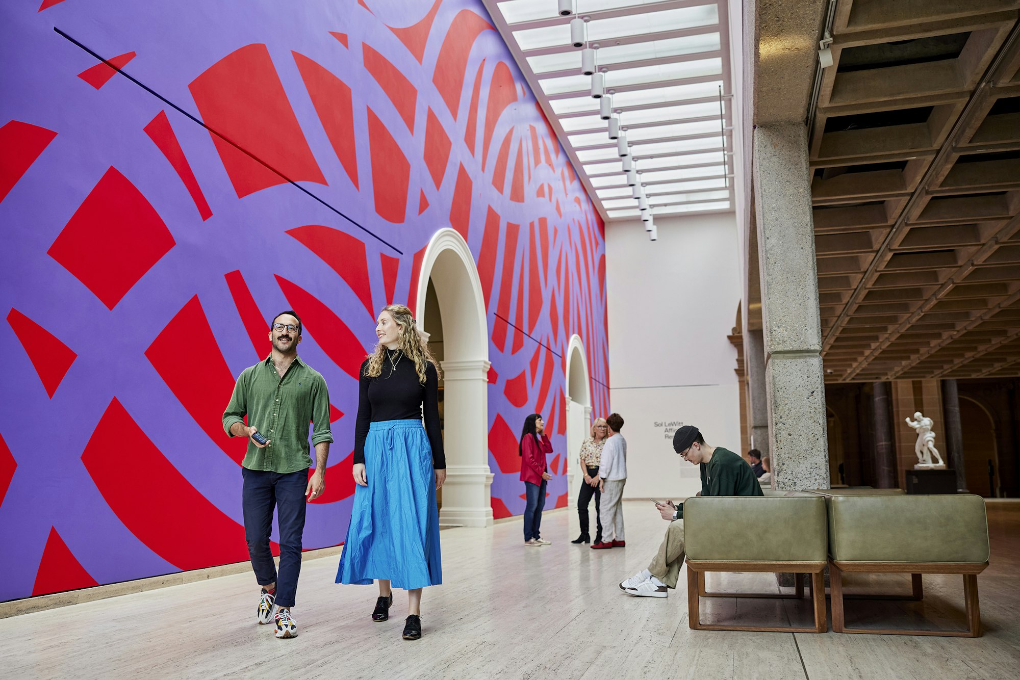 Installation view of Sol LeWitt Wall drawing #955, Loopy Doopy (red and purple) 2000 at the Art Gallery of New South Wales, first drawn by Paolo Arao, Nicole Awai, Hidemi Nomura, Jean Shin, Frankie Woodruff at the Whitney Museum of American Art, New York, November 2000; current installation drawn by Kit Bylett, Andrew Colbert, Troy Donaghy, Szymon Dorabialski, Gabriel Hurier, Rachel Levine, Owen Lewis, Nadia Odlum, Tim Silver, Alexis Wildman, August 2022 © Estate of Sol LeWitt/ARS, Copyright Agency