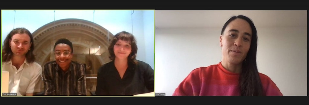 A split screen with three people in a room on the screen at left and one person in another room on the screen at right