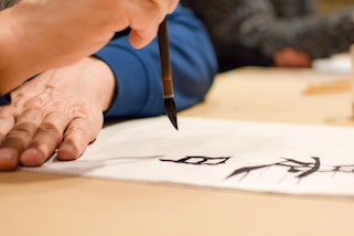 Chinese calligraphy drawing, photo: Vladislav Vladimirov / Alamy Stock Photo