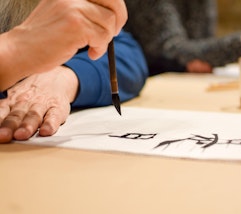 Chinese calligraphy drawing, photo: Vladislav Vladimirov / Alamy Stock Photo