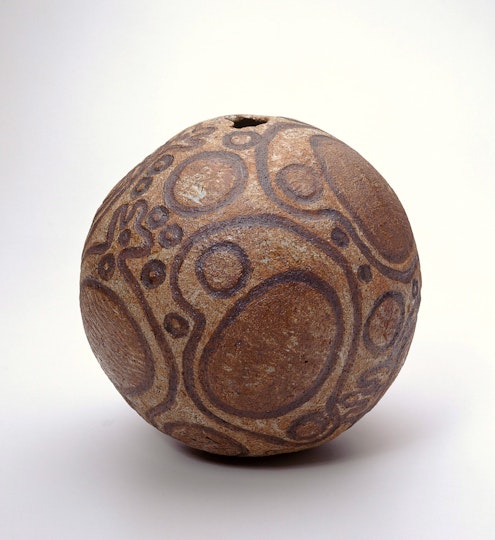 A sphere decorated with circular patterns