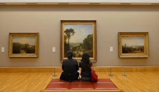 Visitors in front of William Turner's paintings, Tate Britain, England, photo: Alamy