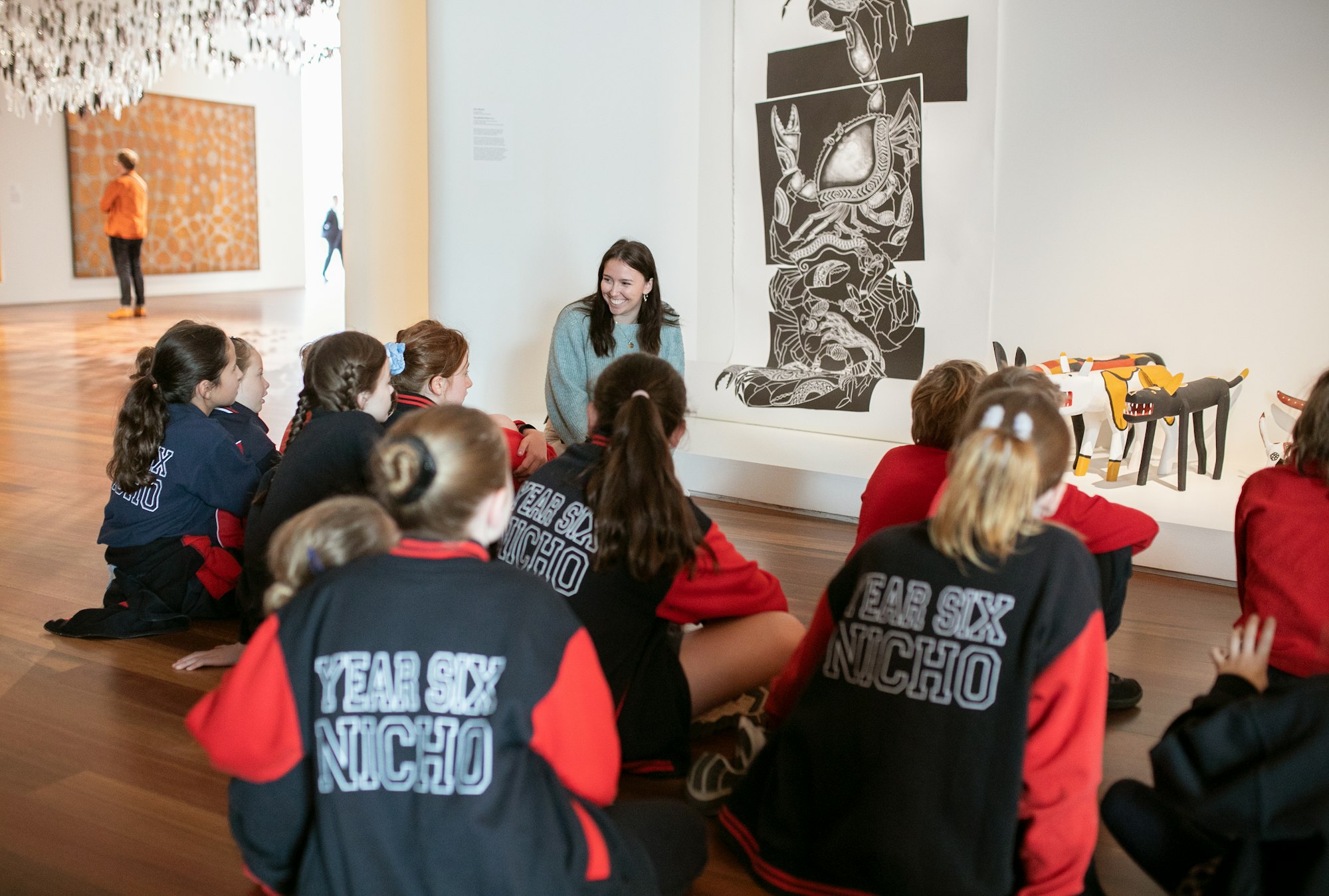 Art Gallery educator speaking with students at the Art Gallery of New South Wales.