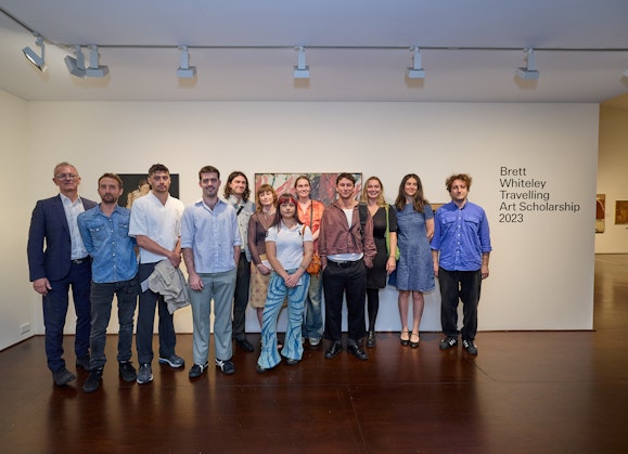 Left to right: Art Gallery of New South Wales director Michael Brand, artist and 2023 scholarship judge Guido Maestri and Brett Whiteley Travelling Art Scholarship 2023 recipients and finalists