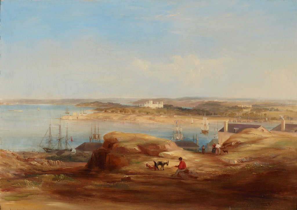 A natural harbour with a few sailing ships and a few buildings, including a castle-like structure on a distant headland