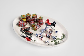 Mechelle Bounpraseuth Rooster plate with Haw Haw, Kopiko and White Rabbit candy 2023, Manly Art Gallery & Museum Collection