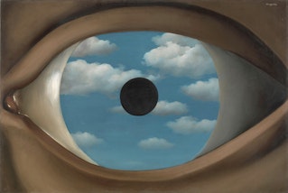 A close-up of an eye with a cloudy blue sky for an iris