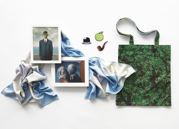 Two prints of artworks, three brooches, a scarf and a bag