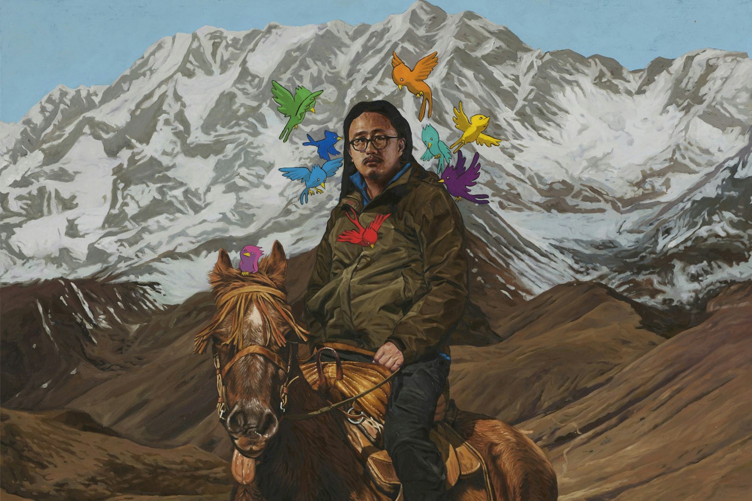 A man sitting on a horse with mountains in the background and colourful birds flying around his head.